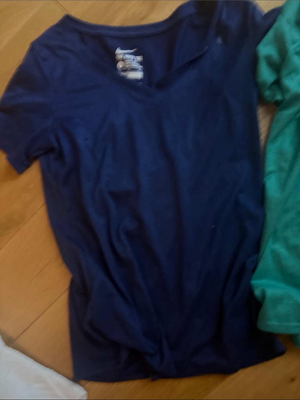 Nike Navy V-Neck Short Sleeve small Tee for Women and a green v neck short sleev